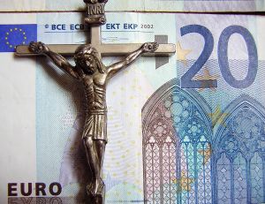 Crucifixo e dinheiro